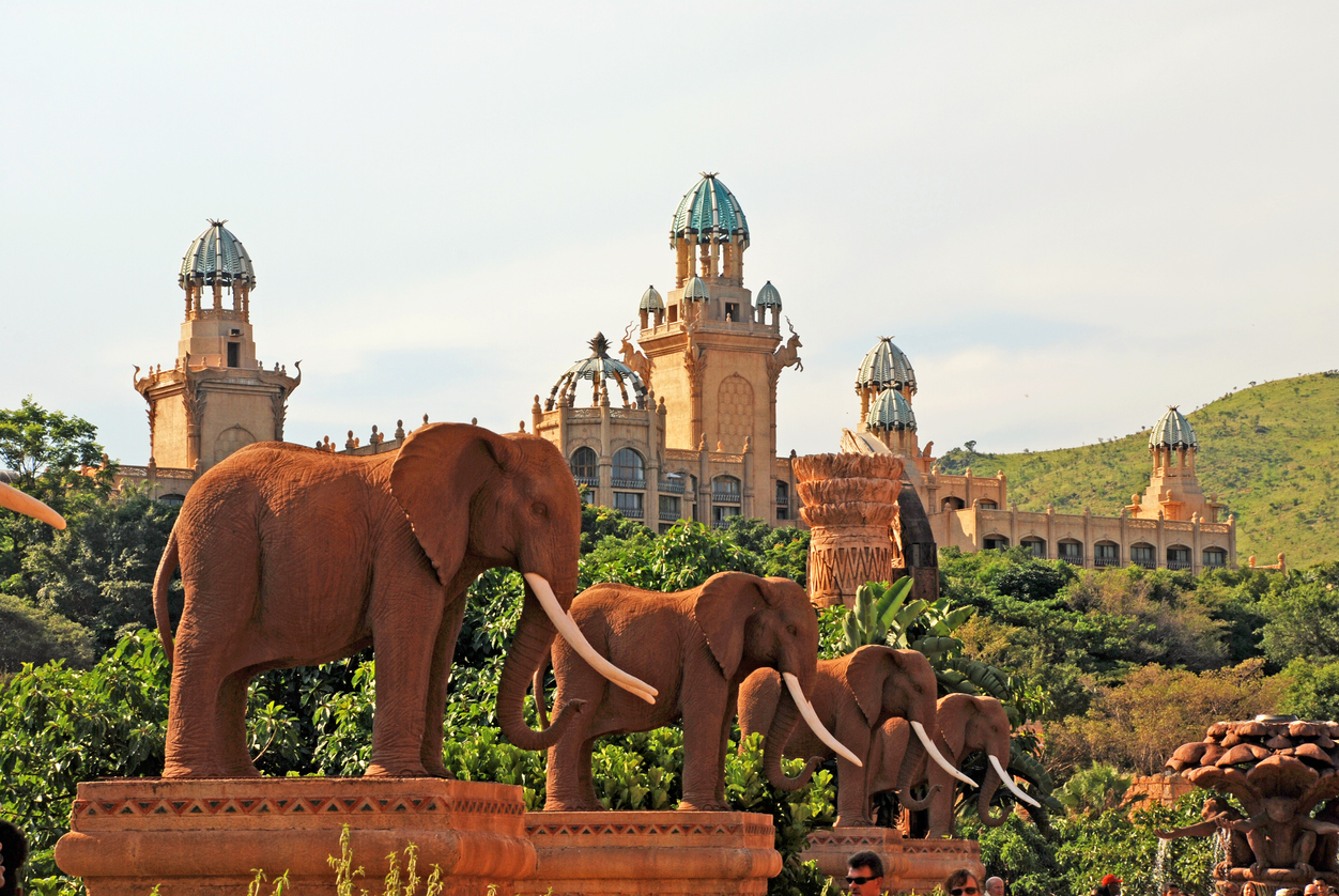 Gigantic elephant statues on Bridge of Time in famous resort Lost City in Sun City, South Africa.